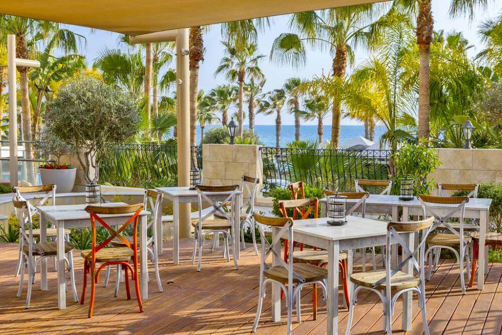 aquamare beach hotel outdoor seating cyprus