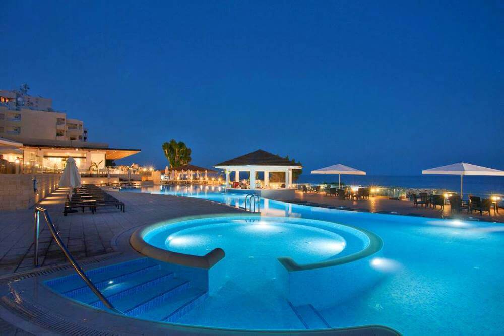 the royal apollonia swimmingpool by night