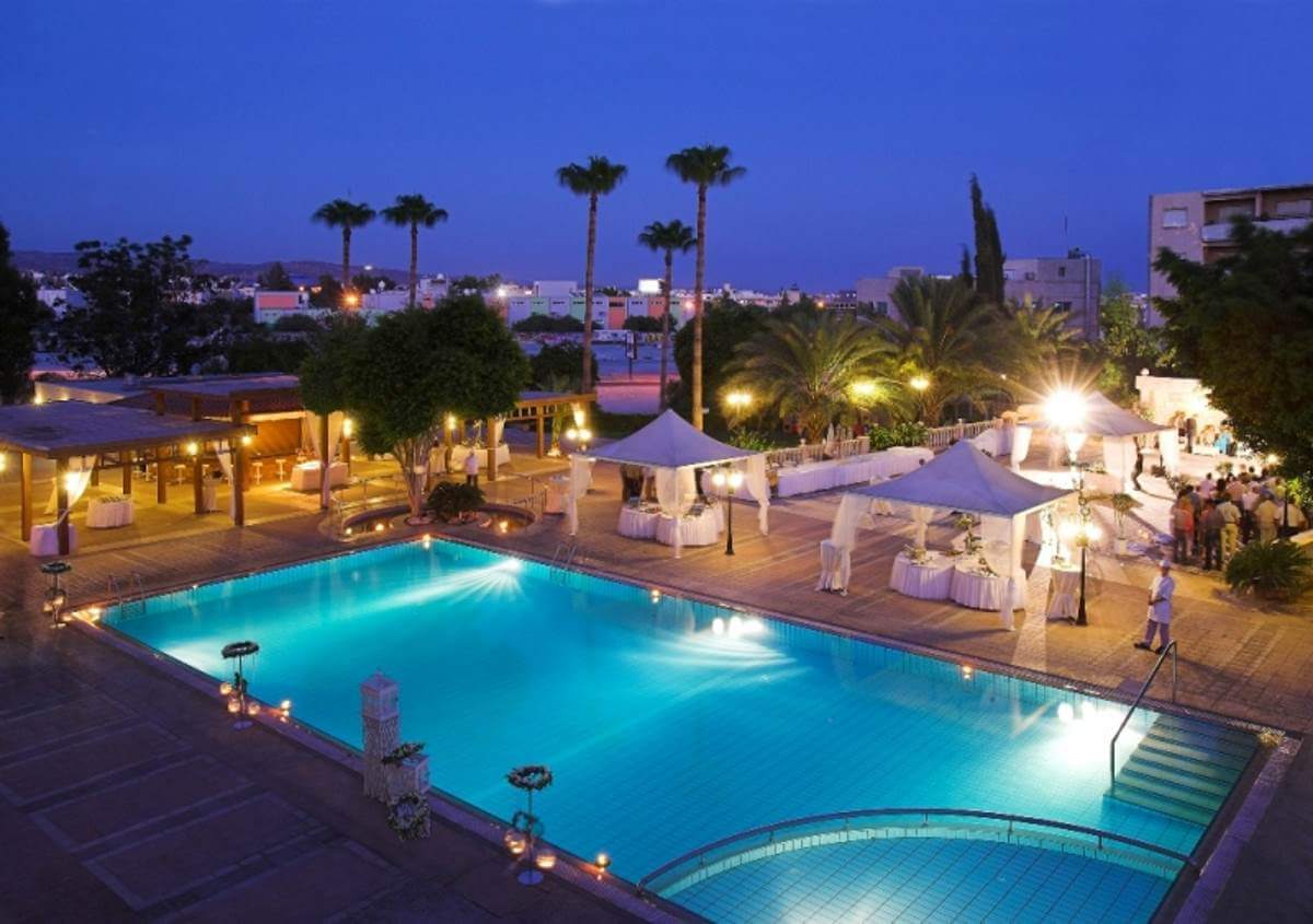 ajax hotel pool night view